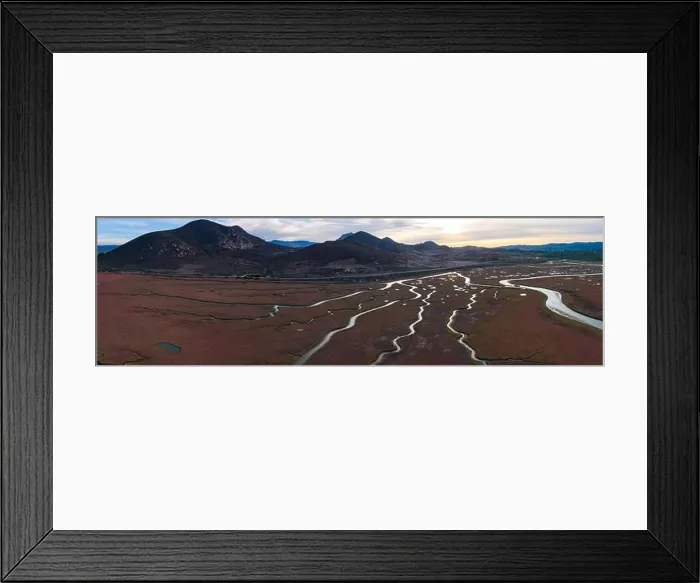 Framed Print : Narrow channels meander through a beautiful estuary in Central California. Estuaries form when freshwater runoff meets and mixes with seawater Framed Print : Narrow channels meander through a beautiful estuary in Central California. Estuaries form when freshwater runoff meets and mixes with seawater