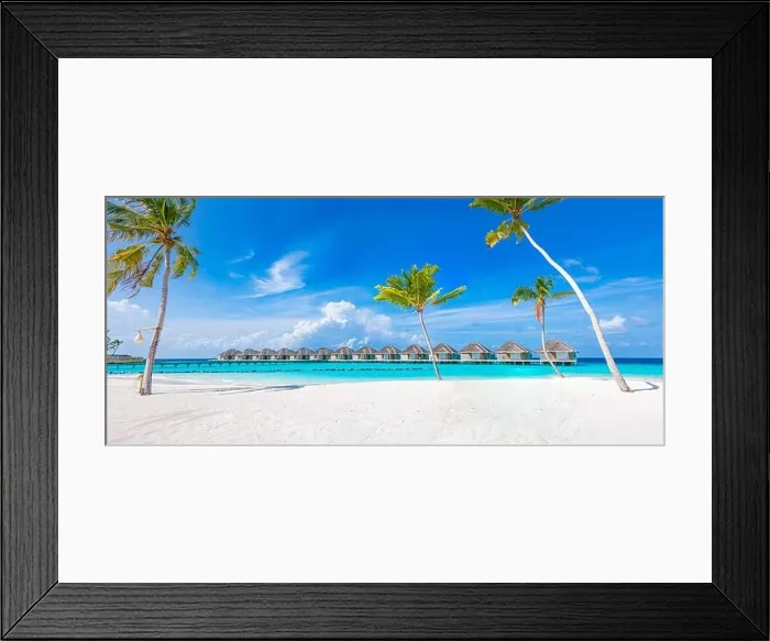 Framed Print : Idyllic tropical beach landscape with water villas and bungalows. Design of tourism summer vacation holiday destination concept. Luxury island beach Framed Print : Idyllic tropical beach landscape with water villas and bungalows. Design of tourism summer vacation holiday destination concept. Luxury island beach