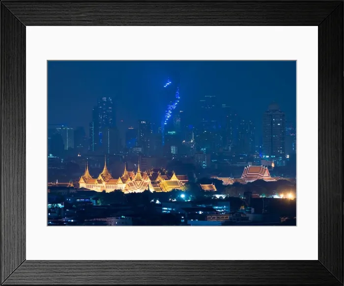 Framed Print : Grand palace bangkok with bangkok city skyscrapers at night in Bangkok, Thailand Framed Print : Grand palace bangkok with bangkok city skyscrapers at night in Bangkok, Thailand