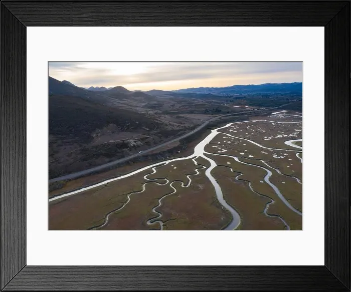 Framed Print : Narrow channels meander through a beautiful estuary in Central California. Estuaries form when freshwater runoff meets and mixes with seawater Framed Print : Narrow channels meander through a beautiful estuary in Central California. Estuaries form when freshwater runoff meets and mixes with seawater