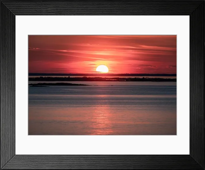 Framed Print : Scenic sunset with empty sea and colorful sky at evening in Finland Framed Print : Scenic sunset with empty sea and colorful sky at evening in Finland