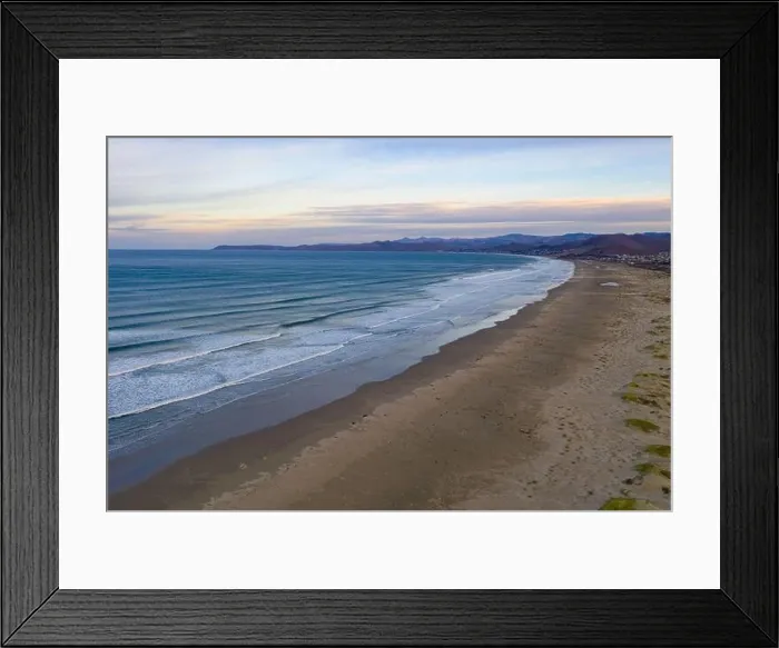 Framed Print : The Pacific Ocean washes onto a beach and sand dunes in Morro Bay, California. This coastal part of California is known for its amazing coastline Framed Print : The Pacific Ocean washes onto a beach and sand dunes in Morro Bay, California. This coastal part of California is known for its amazing coastline