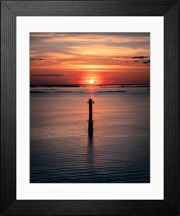 Framed Print : Scenic sunset landscape with sea and lighthouse at evening in Finland Framed Print : Scenic sunset landscape with sea and lighthouse at evening in Finland