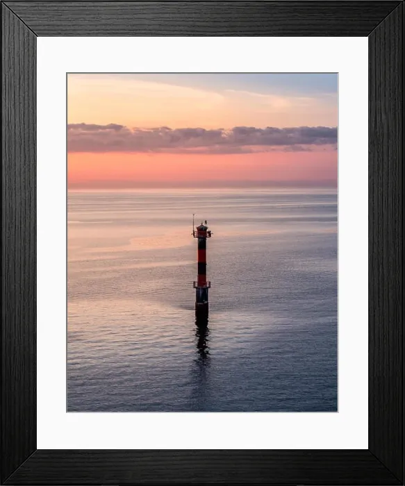 Framed Print : Scenic sunset landscape with sea and lighthouse at evening in Finland Framed Print : Scenic sunset landscape with sea and lighthouse at evening in Finland