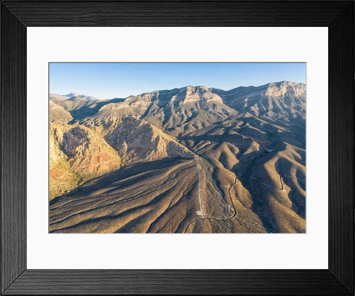 Framed Print : Early light shines on the massive geologic formations in Red Rock Canyon National Conservation Area, located just outside of Las Vegas, NV Framed Print : Early light shines on the massive geologic formations in Red Rock Canyon National Conservation Area, located just outside of Las Vegas, NV