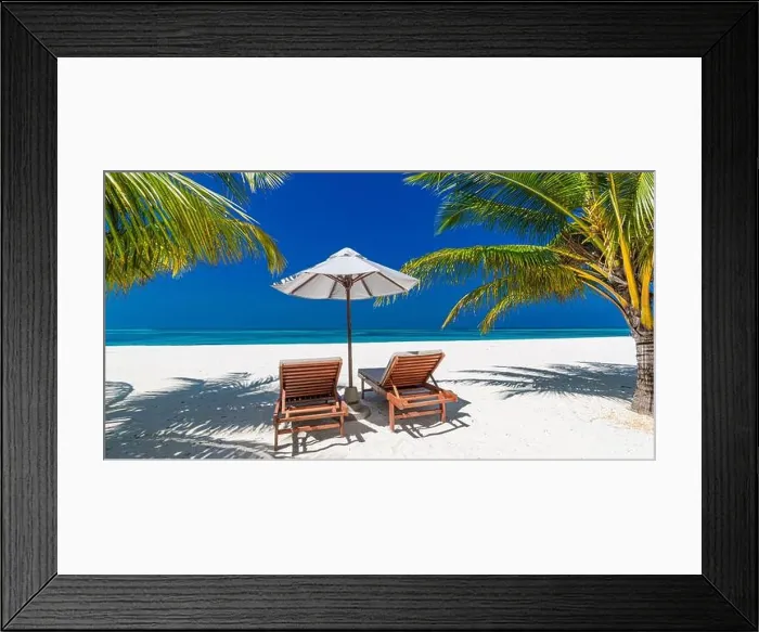Framed Print : Tropical beach nature as summer landscape with lounge chairs and palm trees and calm sea for beach banner. Luxurious travel vacation holiday landscape Framed Print : Tropical beach nature as summer landscape with lounge chairs and palm trees and calm sea for beach banner. Luxurious travel vacation holiday landscape