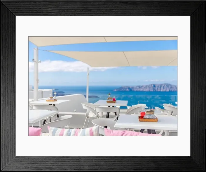 Framed Print : Beautiful terrace with sea view. Santorini island, Greece. Summer romantic travel restaurant on terrace with view on sea, Santorini island, Cyclades Framed Print : Beautiful terrace with sea view. Santorini island, Greece. Summer romantic travel restaurant on terrace with view on sea, Santorini island, Cyclades