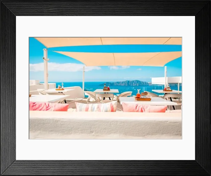 Framed Print : Beautiful terrace with sea view. Santorini island, Greece. Summer romantic travel restaurant on terrace with view on sea, Santorini island, Cyclades Framed Print : Beautiful terrace with sea view. Santorini island, Greece. Summer romantic travel restaurant on terrace with view on sea, Santorini island, Cyclades