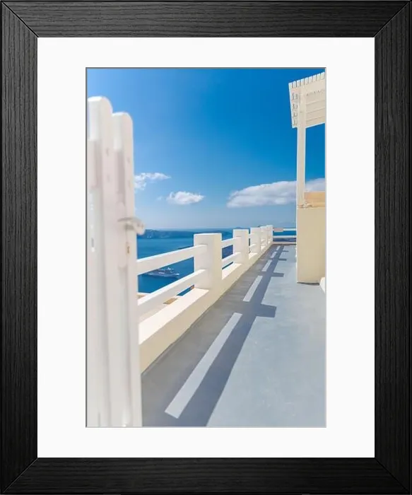 Framed Print : Fantastic travel background, Santorini urban landscape. Red door, gate with stairs white architecture under blue sky. Idyllic summer vacation luxury Framed Print : Fantastic travel background, Santorini urban landscape. Red door, gate with stairs white architecture under blue sky. Idyllic summer vacation luxury