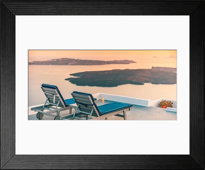 Framed Print : Infinity pool on the rooftop at sunset in Santorini Island, Greece. Beautiful poolside and sunset sky. Luxurious summer vacation and holiday concept Framed Print : Infinity pool on the rooftop at sunset in Santorini Island, Greece. Beautiful poolside and sunset sky. Luxurious summer vacation and holiday concept