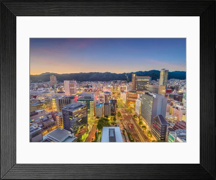 Framed Print : Kobe, Japan skyline over Flower Road and the Sannomiya District towards Mount Rokko at dusk