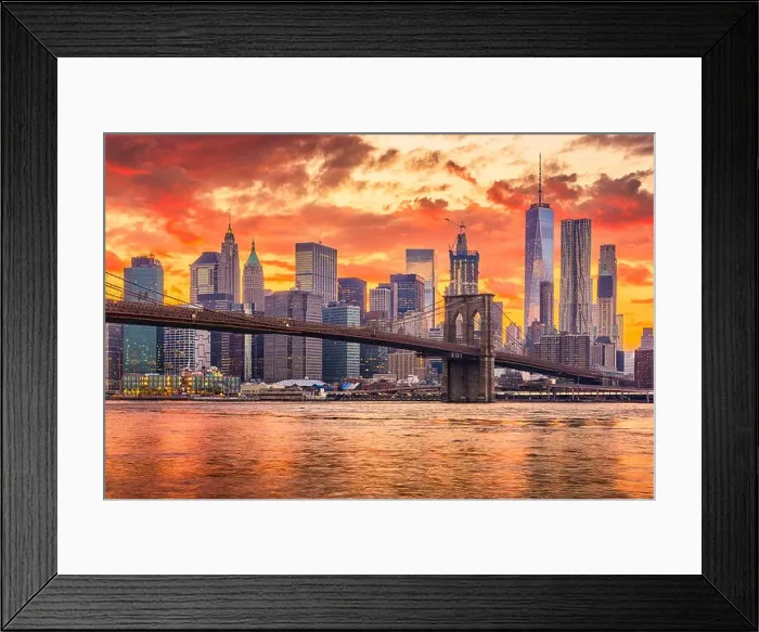Framed Print : New York, New York, USA skyline of Manhattan on the East River with Brooklyn Bridge after sunset Framed Print : New York, New York, USA skyline of Manhattan on the East River with Brooklyn Bridge after sunset