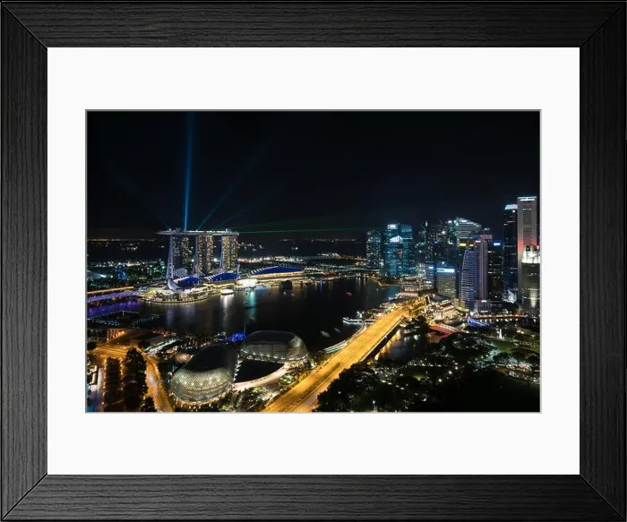 Framed Print : Colorful Singapore skyscraper building and laser show in night at Singapore Framed Print : Colorful Singapore skyscraper building and laser show in night at Singapore