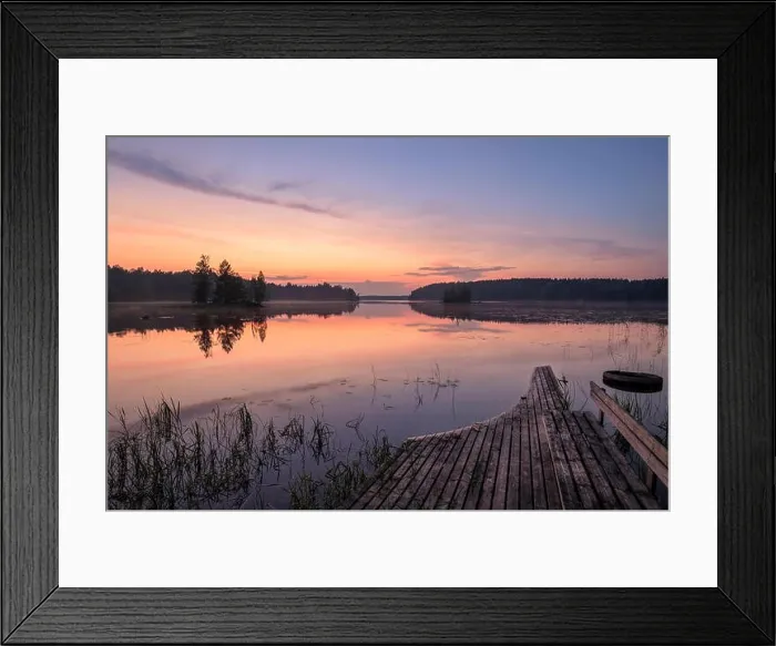 Framed Print : Scenic lake view with beautiful sunset, garbage and broken pier at summer night in Finland Framed Print : Scenic lake view with beautiful sunset, garbage and broken pier at summer night in Finland