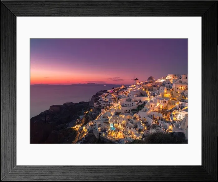 Framed Print : Stunning sunset landscape. Beautiful view of fabulous village of Oia with traditional white houses and windmills in Santorini island at night, Greece Framed Print : Stunning sunset landscape. Beautiful view of fabulous village of Oia with traditional white houses and windmills in Santorini island at night, Greece