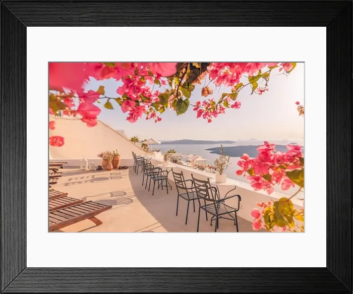 Framed Print : Oia town on Santorini island, Greece. Traditional famous white blue houses with flowers under sunny weather caldera, Aegean sea. Beautiful summer view Framed Print : Oia town on Santorini island, Greece. Traditional famous white blue houses with flowers under sunny weather caldera, Aegean sea. Beautiful summer view