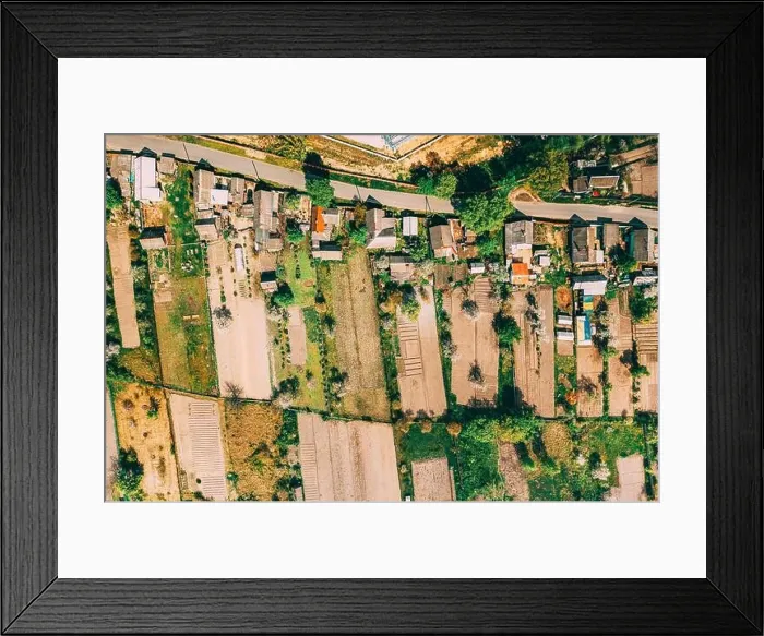 Framed Print : Russia. Aerial View Of Small Town, Village Cityscape Skyline In Summer Day. Residential District, Houses And Vegetable Garden Beds In Bird's-eye View Framed Print : Russia. Aerial View Of Small Town, Village Cityscape Skyline In Summer Day. Residential District, Houses And Vegetable Garden Beds In Bird's-eye View