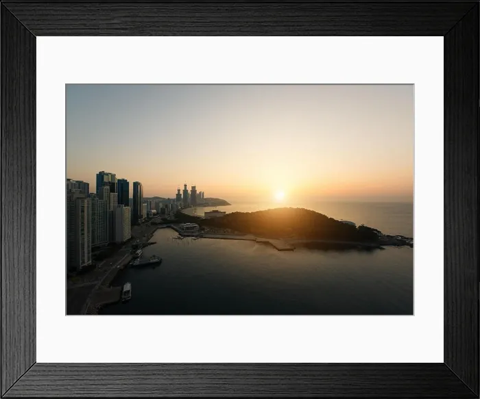 Framed Print : Sunrise at Haeundae beach in Busan. Haeundae beach is Busan's most popular beach in South Korea