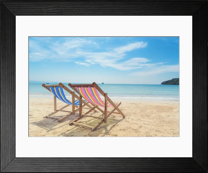 Framed Print : Two beach chairs on the white sand with blue sky and summer sea background. Summer, Vacation, Travel and Holiday concept Framed Print : Two beach chairs on the white sand with blue sky and summer sea background. Summer, Vacation, Travel and Holiday concept