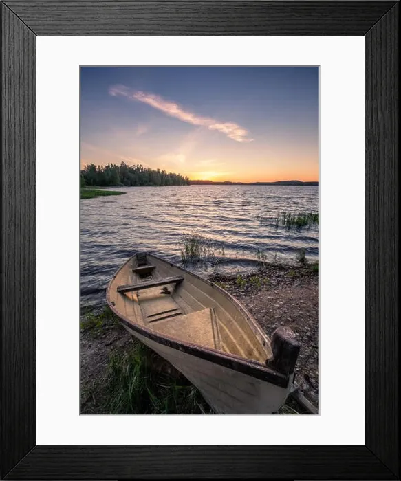 Framed Print : Scenic landscape with idyllic lake view and boat at summer evening in Finland
