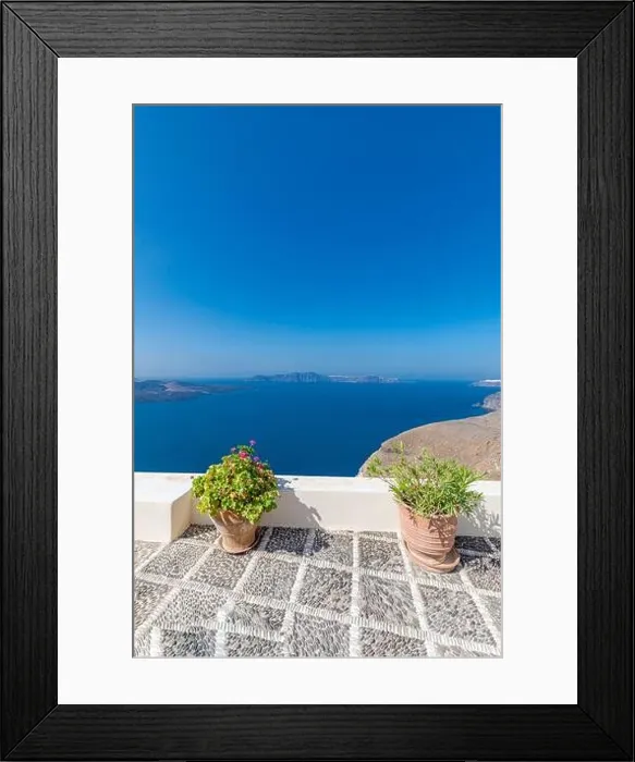 Framed Print : White wash architecture on Santorini Island, Greece. The view toward Caldera sea with relaxing summer travel vacation mood, vibes. Romance love couple Framed Print : White wash architecture on Santorini Island, Greece. The view toward Caldera sea with relaxing summer travel vacation mood, vibes. Romance love couple