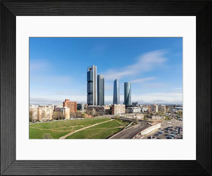 Framed Print : Madrid cityscape at daytime. Landscape of Madrid business building at Four Tower. Modern high building in business district area at Spain Framed Print : Madrid cityscape at daytime. Landscape of Madrid business building at Four Tower. Modern high building in business district area at Spain
