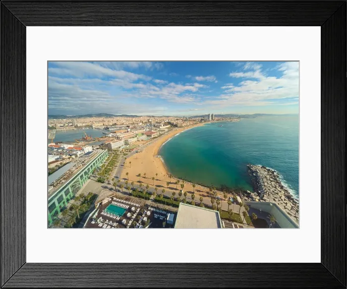 Framed Print : Aerial view of Barcelona Beach in summer day along seaside in Barcelona, Spain. Mediterranean Sea in Spain Framed Print : Aerial view of Barcelona Beach in summer day along seaside in Barcelona, Spain. Mediterranean Sea in Spain