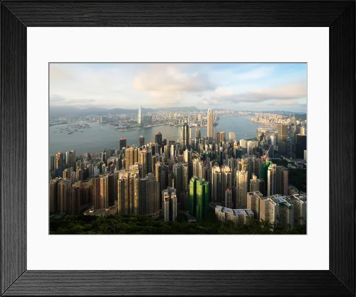 Framed Print : Aerial view of Hong Kong skyline and Victoria Harbor with blue sky in Hong Kong. Asia Framed Print : Aerial view of Hong Kong skyline and Victoria Harbor with blue sky in Hong Kong. Asia