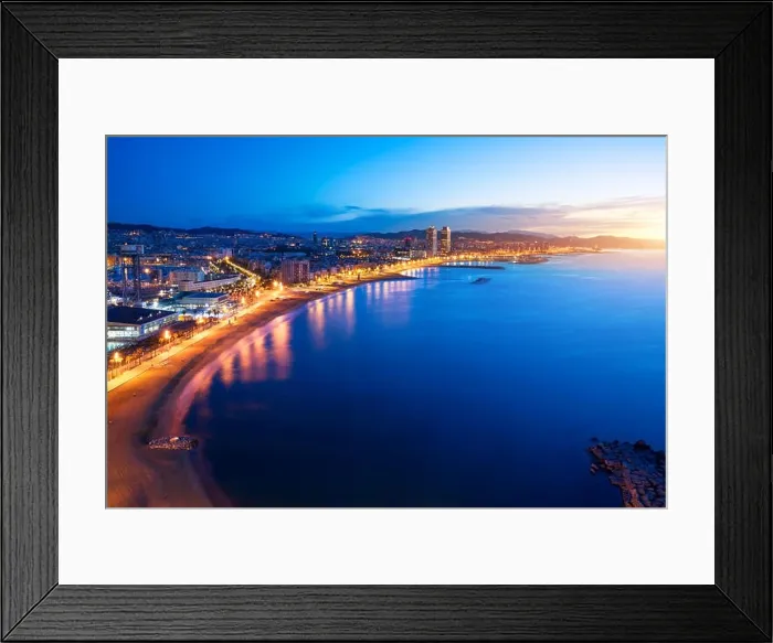 Framed Print : Aerial view of Barcelona Beach in summer night along seaside in Barcelona, Spain. Mediterranean Sea in Spain Framed Print : Aerial view of Barcelona Beach in summer night along seaside in Barcelona, Spain. Mediterranean Sea in Spain