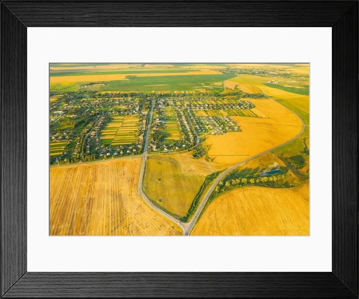 Framed Print : Aerial View Of Village And Hay Rolls, Straw Field Landscape In Summer Evening. Haystack, Hay Roll in Sunrise Time. Agricultural Countryside landscape Framed Print : Aerial View Of Village And Hay Rolls, Straw Field Landscape In Summer Evening. Haystack, Hay Roll in Sunrise Time. Agricultural Countryside landscape