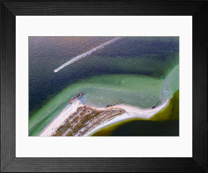 Framed Print : Old shipwreck reinforced concrete barge abandoned stand on beach on the coast of Black sea in Kinburn peninsula, Ukraine Framed Print : Old shipwreck reinforced concrete barge abandoned stand on beach on the coast of Black sea in Kinburn peninsula, Ukraine