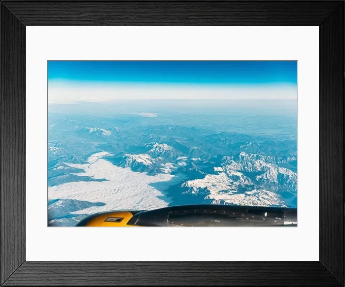 Framed Print : Aerial View From Airplane Window On Snowy Top Of Tatra Mountains In Summer Day. High Attitude Framed Print : Aerial View From Airplane Window On Snowy Top Of Tatra Mountains In Summer Day. High Attitude