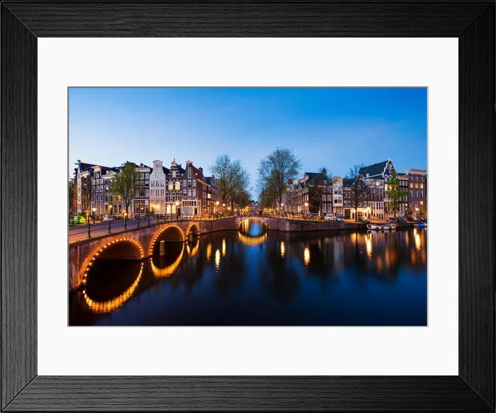 Framed Print : Canals of Amsterdam at night. Amsterdam is the capital and most populous city of the Netherlands Framed Print : Canals of Amsterdam at night. Amsterdam is the capital and most populous city of the Netherlands