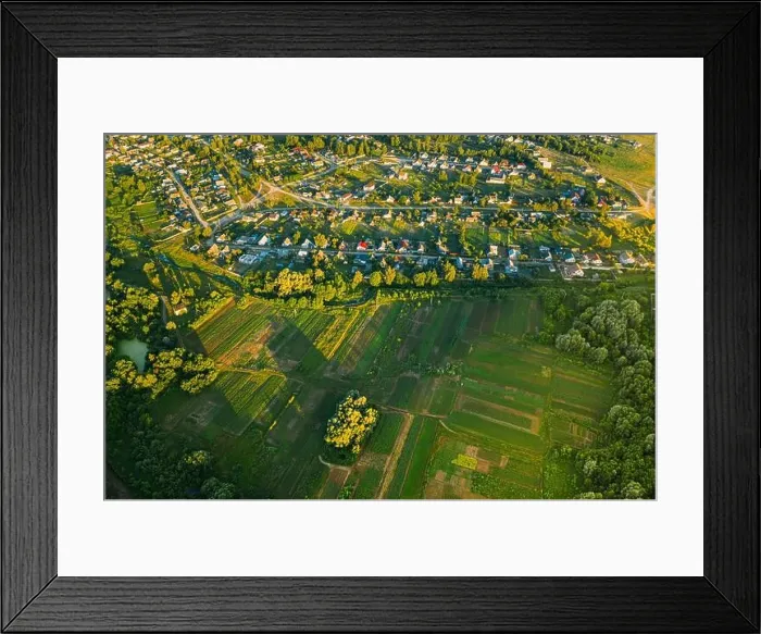 Framed Print : Aerial View Of Vegetable Gardens In Small Town Or Village. Skyline In Summer Evening. Village Garden Beds In Bird's-eye View Framed Print : Aerial View Of Vegetable Gardens In Small Town Or Village. Skyline In Summer Evening. Village Garden Beds In Bird's-eye View