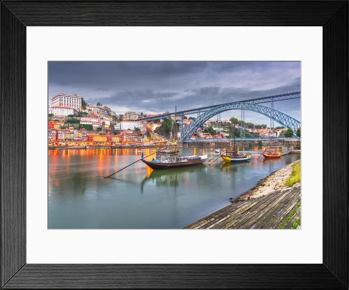 Framed Print : Porto, Portugal old town skyline on the Douro River with rabelo boats at dusk Framed Print : Porto, Portugal old town skyline on the Douro River with rabelo boats at dusk