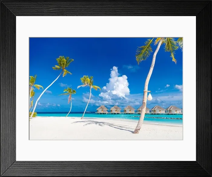 Framed Print : Perfect island beach with water villas, luxury bungalows under palm trees, close to blue sea. Amazing travel destination, relax beach resort landscape Framed Print : Perfect island beach with water villas, luxury bungalows under palm trees, close to blue sea. Amazing travel destination, relax beach resort landscape