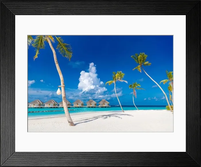Framed Print : Perfect island beach with water villas, luxury bungalows under palm trees, close to blue sea. Amazing travel destination, relax beach resort landscape Framed Print : Perfect island beach with water villas, luxury bungalows under palm trees, close to blue sea. Amazing travel destination, relax beach resort landscape