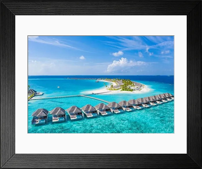 Framed Print : Maldives paradise island. Tropical aerial landscape, seascape with long jetty, water villas with amazing sea and lagoon beach tropical nature. Exotic Framed Print : Maldives paradise island. Tropical aerial landscape, seascape with long jetty, water villas with amazing sea and lagoon beach tropical nature. Exotic
