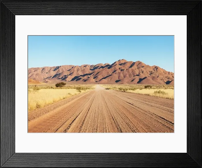 Framed Print : Gravel road and beautiful landscape with sunset sky Framed Print : Gravel road and beautiful landscape with sunset sky
