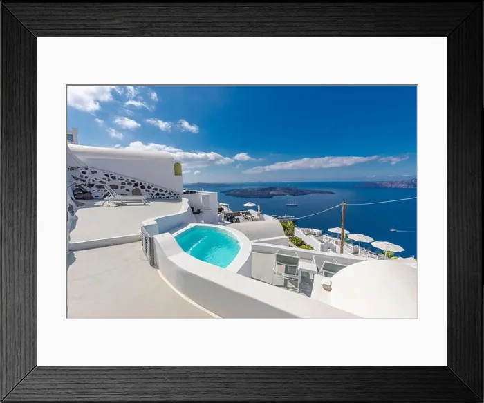 Framed Print : White architecture on Santorini island, Greece. Swimming pool in luxury hotel. Beautiful view on the sea, summer vacation, travel destination stunning Framed Print : White architecture on Santorini island, Greece. Swimming pool in luxury hotel. Beautiful view on the sea, summer vacation, travel destination stunning