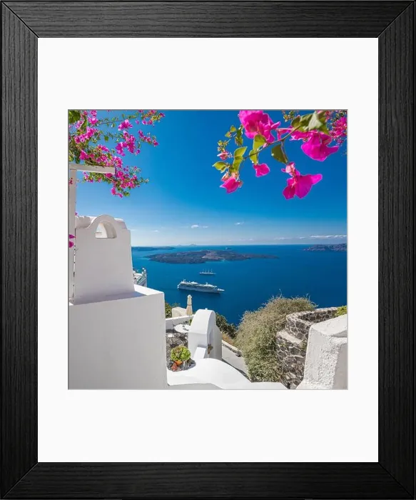 Framed Print : Santorini island, Oia, Greece. Traditional famous white architecture flowers under sunny weather over Caldera, Aegean sea. Beautiful summer vacation