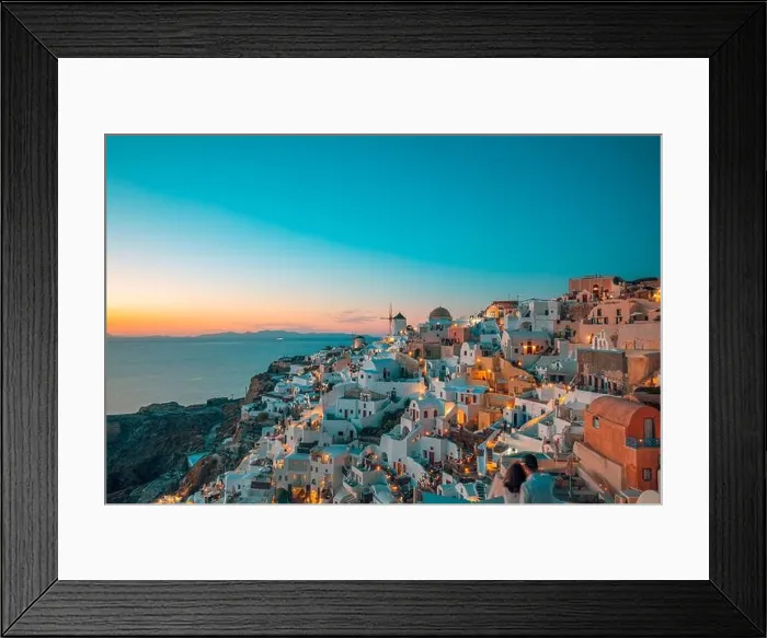 Framed Print : Amazing evening view of Santorini island. Picturesque spring sunset on the famous Oia village, Greece, Europe. Traveling concept background. Artistic Framed Print : Amazing evening view of Santorini island. Picturesque spring sunset on the famous Oia village, Greece, Europe. Traveling concept background. Artistic