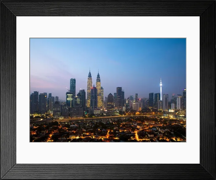 Framed Print : Kuala lumpur cityscape. Panoramic view of Kuala Lumpur city skyline during sunrise viewing skyscrapers building and Petronas twin tower in Malaysia Framed Print : Kuala lumpur cityscape. Panoramic view of Kuala Lumpur city skyline during sunrise viewing skyscrapers building and Petronas twin tower in Malaysia