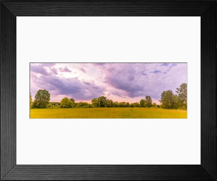 Framed Print : Landscape of sunrise over mountain. Dramatic clouds and colorful sky over green trees and summer meadow flowers Framed Print : Landscape of sunrise over mountain. Dramatic clouds and colorful sky over green trees and summer meadow flowers