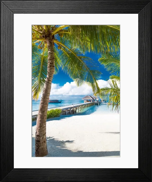 Framed Print : Maldives island, luxury water villas resort and wooden pier. Beautiful sky and clouds and beach background for summer vacation holiday and travel Framed Print : Maldives island, luxury water villas resort and wooden pier. Beautiful sky and clouds and beach background for summer vacation holiday and travel