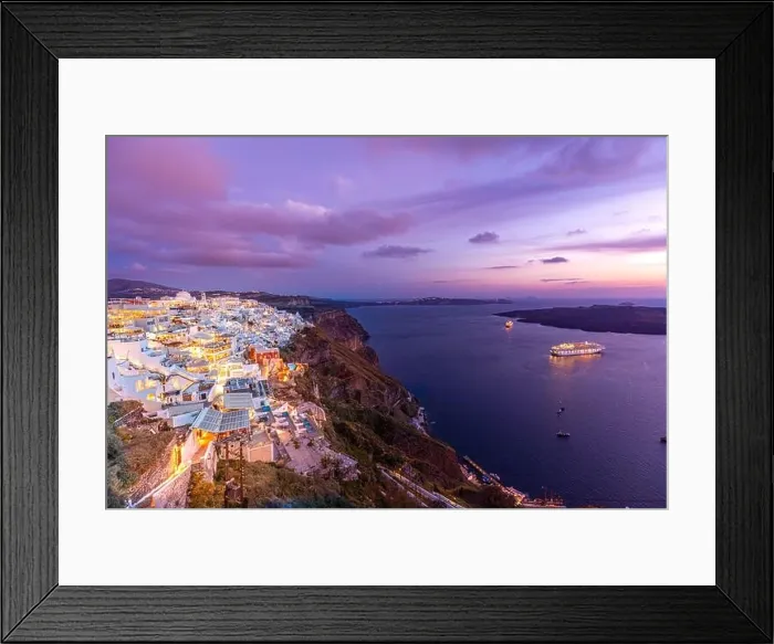 Framed Print : Santorini, Greece. Famous sunset view of traditional white architecture Santorini landscape with flowers in foreground. Summer vacation luxury travel Framed Print : Santorini, Greece. Famous sunset view of traditional white architecture Santorini landscape with flowers in foreground. Summer vacation luxury travel