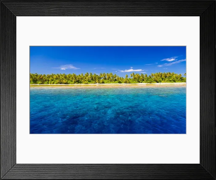 Framed Print : Perfect tropical island and coral reef in Maldives. Tropical blue turquoise sea, palm trees and white sand background. Luxury vacation holiday banner Framed Print : Perfect tropical island and coral reef in Maldives. Tropical blue turquoise sea, palm trees and white sand background. Luxury vacation holiday banner