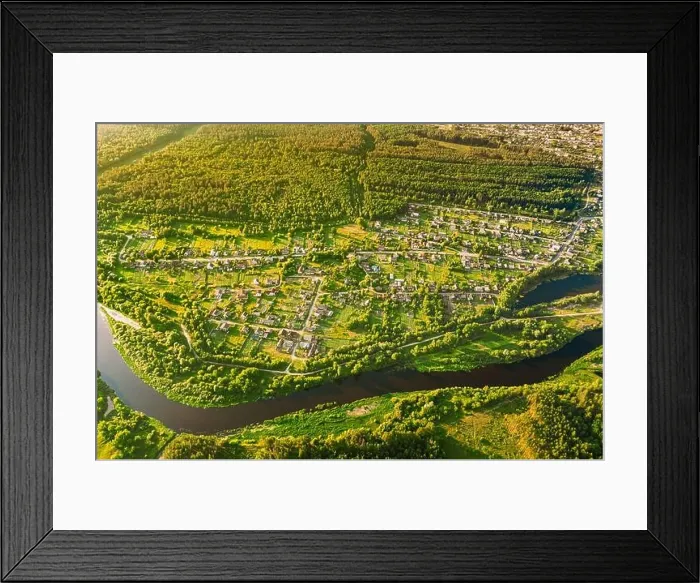 Framed Print : Aerial View Of Calm River And Village In Belarus, Europe. Green Forest Woods Landscape In Sunny Summer Evening. Top View Of Beautiful European Nature Framed Print : Aerial View Of Calm River And Village In Belarus, Europe. Green Forest Woods Landscape In Sunny Summer Evening. Top View Of Beautiful European Nature