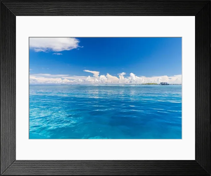 Framed Print : Tropical sea view, endless sea view and blue sky in Maldives island Framed Print : Tropical sea view, endless sea view and blue sky in Maldives island