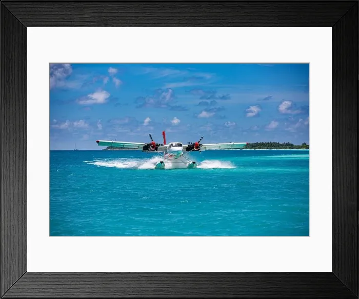 Framed Print : Seaplane at tropical beach resort. Luxury summer travel destination with seaplane in Maldives islands. Exotic vacation holiday transportation Maldives Framed Print : Seaplane at tropical beach resort. Luxury summer travel destination with seaplane in Maldives islands. Exotic vacation holiday transportation Maldives